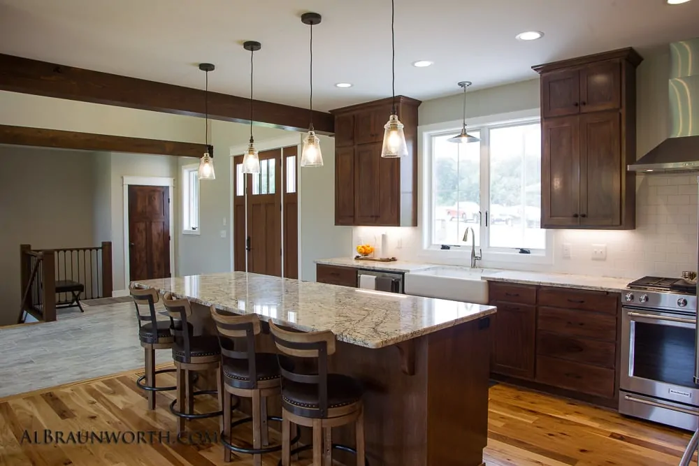 Custom Home timber beam accents kitchen island